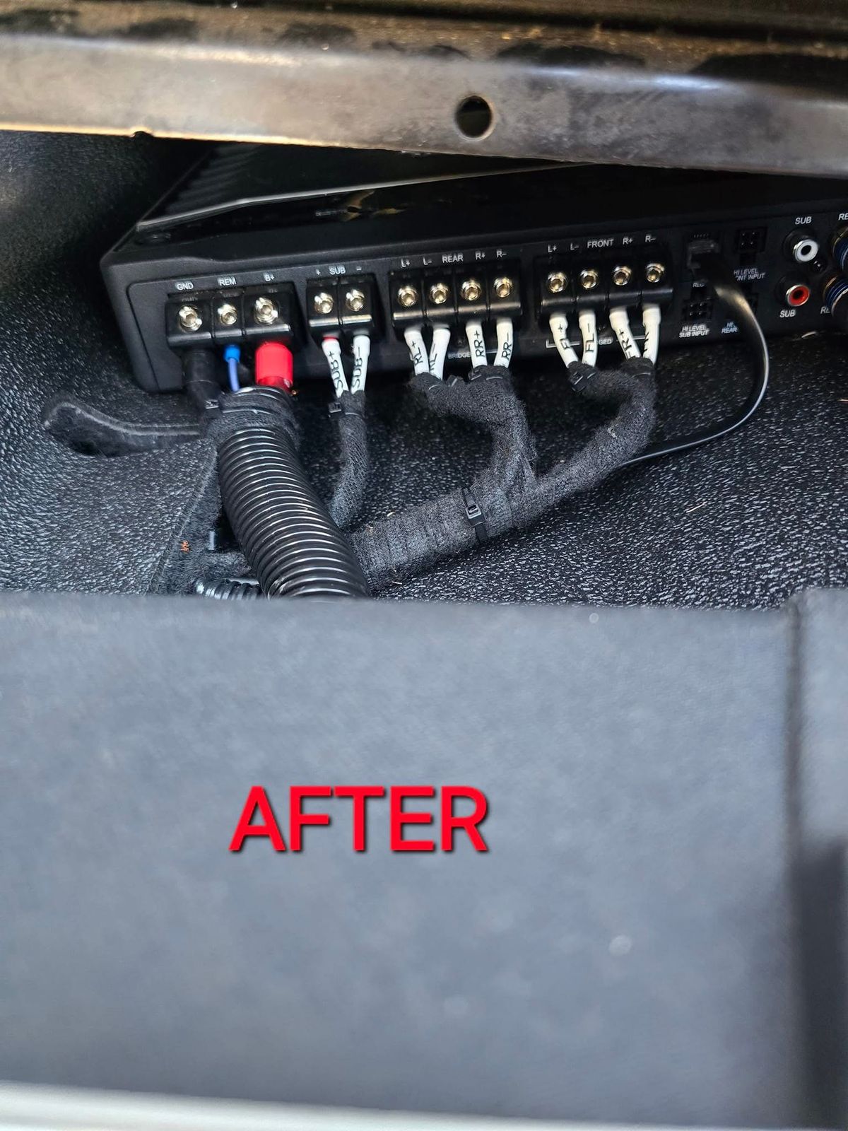 Clean loomed and labeled amplifier wiring by ProWorks Audio